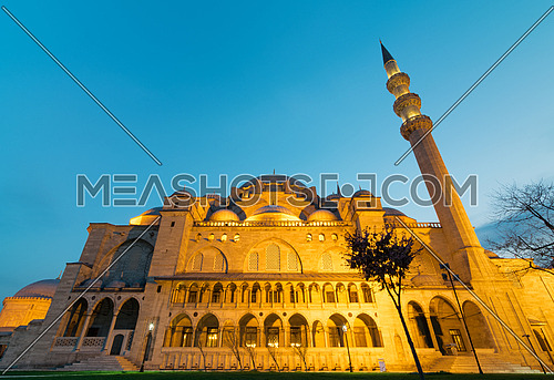 Exterior low angle night shot of Suleymaniye Mosque, an Ottoman imperial mosque located on the Third Hill of Istanbul, Turkey, and the second largest mosque in the city. built in 1557