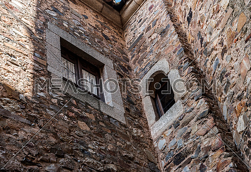 Typical window of the old town of Caceres, Spain