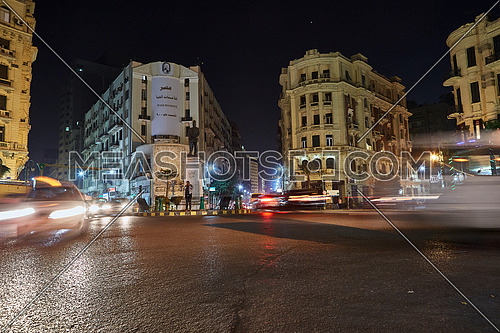 Fixed Shot for traffic at Talat Harb Square at Cairo at Night