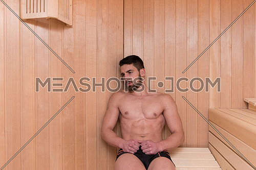 Attractive Man Resting Relaxed In Sauna-101253 | Meashots