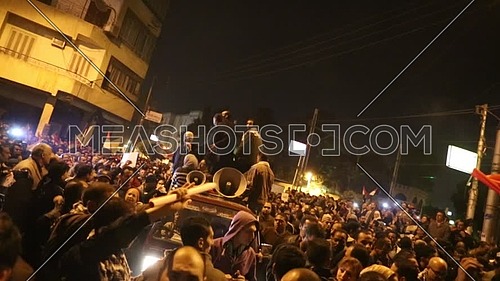 Protest near the presidential palace against Morsi's constitutional declaration at night - December 2012