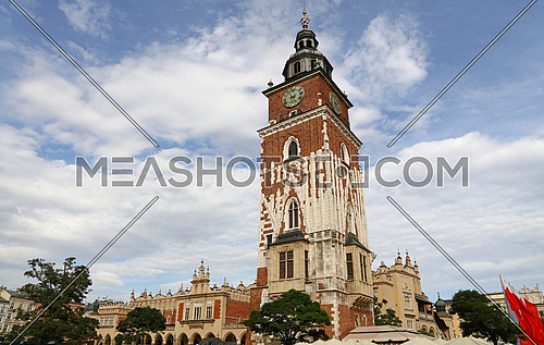 Low angle view of Town Hall tower at Main Market Square of Krakow, Poland