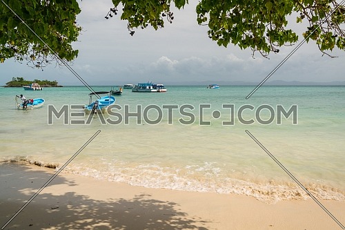 Cayo Levantado nickname Bacardi island, Small port with tourist ships and fishing boats moored,Samana peninsula,Dominican republic