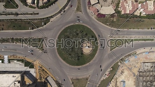 Aerial Bird-Eye shot flying over Cairo Downtown empty streets during the corona pandemic lockdown by day 10 April 2020
