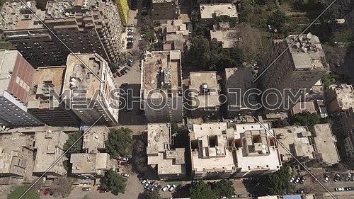Aerial reveal shot flying over Cairo Downtown empty streets during the corona pandemic lockdown by day 10 April 2020
