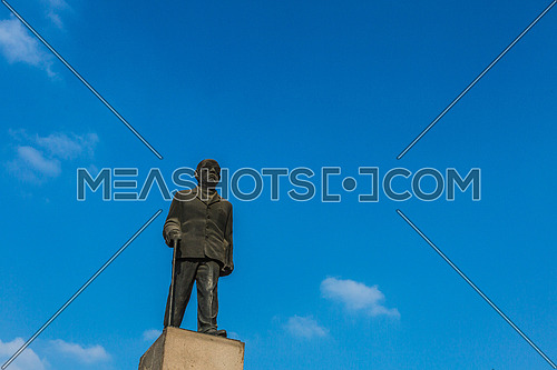 Low angel shot for Naguib Mahfouz Statue at Cairo at Day