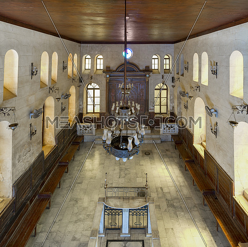 From above interior view of historic Jewish Maimonides Synagogue or Rav Moshe Synagogue with arched windows and chandelier in Cairo Egypt