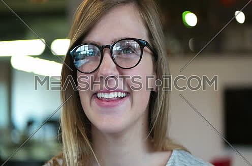 tracking shot of  Young Woman In A Startup Office