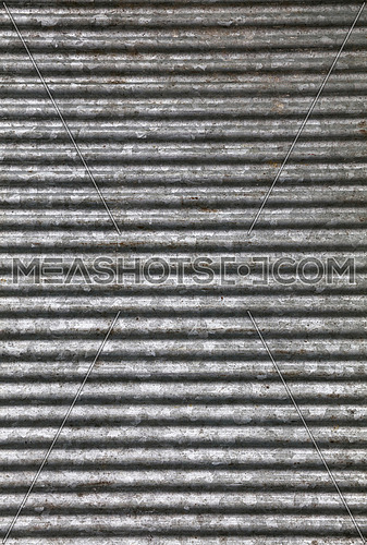 Corrugated goffered gray galvanized metal sheet background texture (washboard, skiffle board)