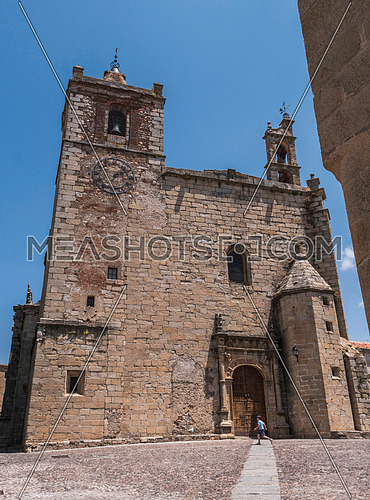 Caceres, Spain - july 13, 2018: Church of San Mateo located in the square of the same name, main facade with Plateresque faÃ§ade, has elements of various styles Gothic, Renaissance, Plateresque and Baroque Caceres, Spain