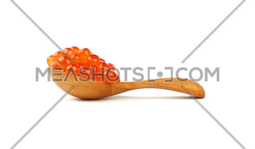 Close up wooden scoop spoon of salmon fish red caviar isolated on white background, low angle side view