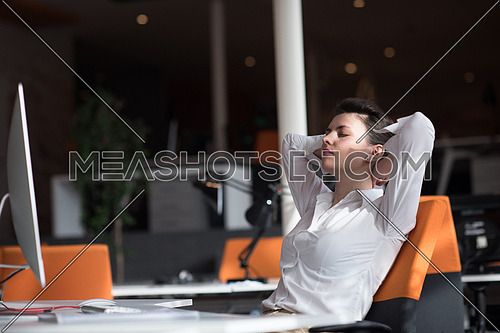 happy young business woman relaxing and geting insiration while working on desktop computer at modern bright  starup office interior