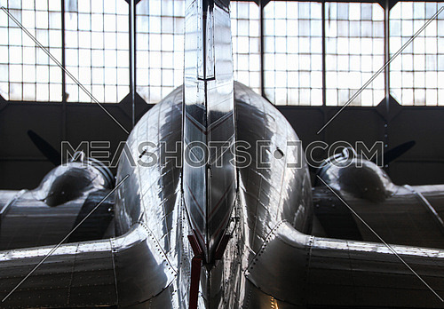 a Douglas dc3 in hanger from behind