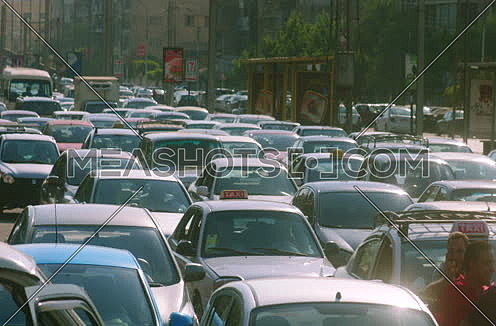 mid shot for a Traffic Jam in Cairo Downtown at noon