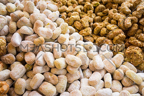 Background of typical sicilian cookies,pastries, made with  almond paste for sale in italian market.