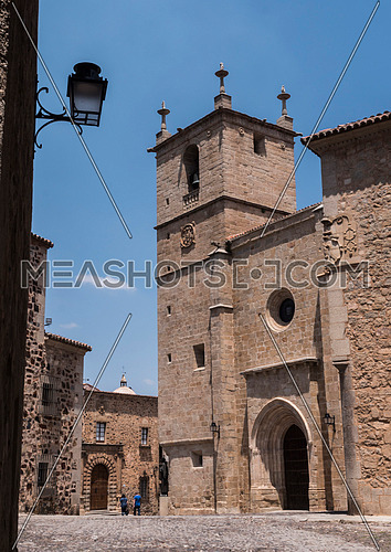 Caceres, Spain - july 13, 2018: Santa Maria's Cathedral, romantic style of transition to Gothic, with some Renaissance elements, placed in the square of Santa Maria, Caceres, Spain
