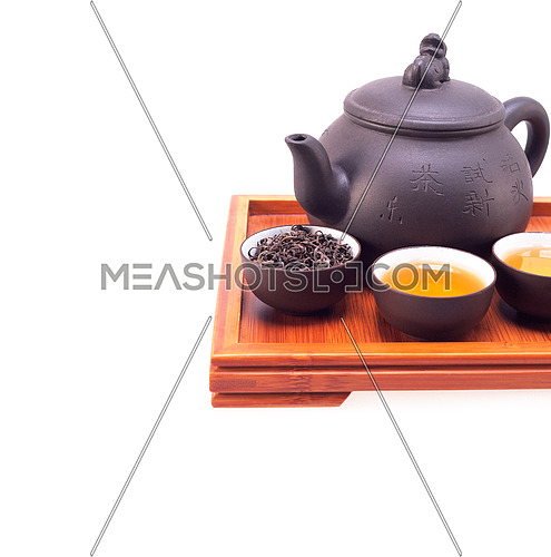 chinese green tea clay pot and cups on bamboo wood tray isolated over white