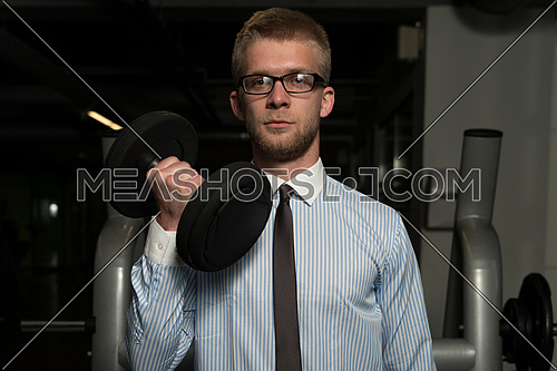 Businessman Working Out Biceps - Dumbbell Concentration Curls