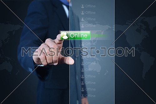 Businessman pressing virtual buttons in color background