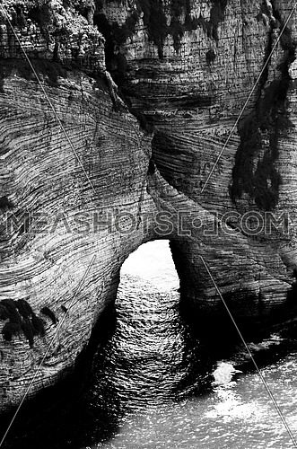 A black and white close up image of Al Rawsha Rock in Beirut Lebanon