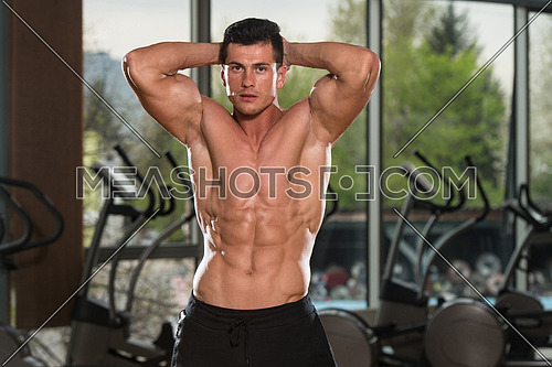 Portrait Of A Physically Fit Man Showing His Well Trained Body