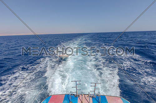 Long shot for backside boat showing Sharm El Shaikh City by day