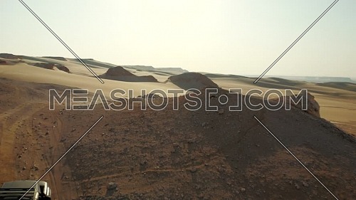 Flying over 4x4 cars offroading in Fayoum Desert