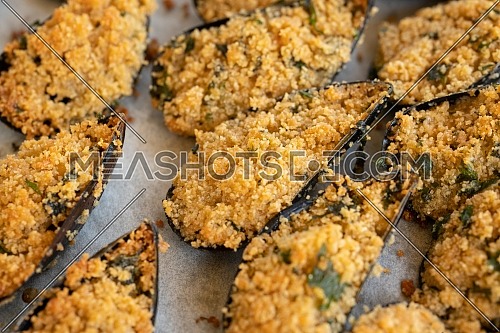 Mussels au Gratin Baked isolated on white background close up