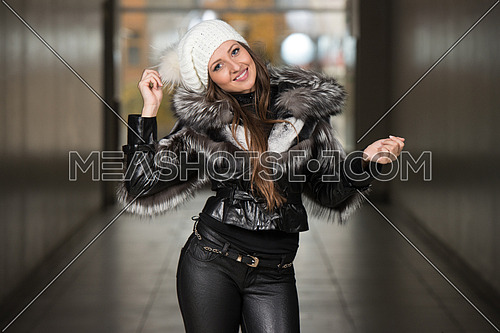 Portrait Of Young And Beautiful Fashion Model In The Shopping Mall - Professional Makeup And Hair Style