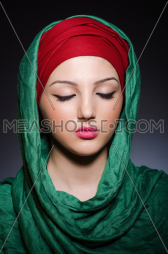 Muslim woman with headscarf in fashion concept