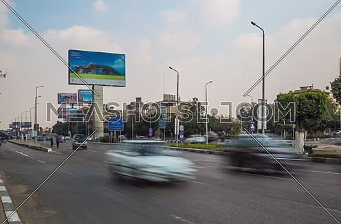 Zoom Out Shot for traffic at Salah Salim Street showing AL Galaa Bridge in background at Daytime