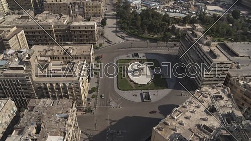 Aerial shot for Ibrahim Pasha Statue at Opera Square in Cairo Downtown empty streets during the corona pandemic lockdown by day 10 April