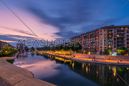 Darsena Naviglio Grande at the evening.when the lights of the city and the bars come on and the nightlife of Milan begins, Milan, Italy.