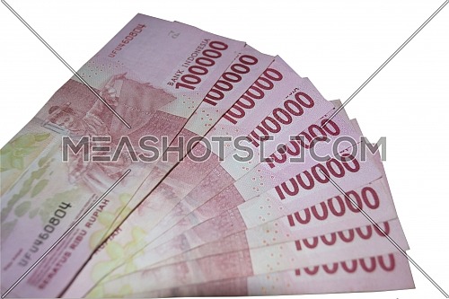 Indonesian money currency lined on a white background