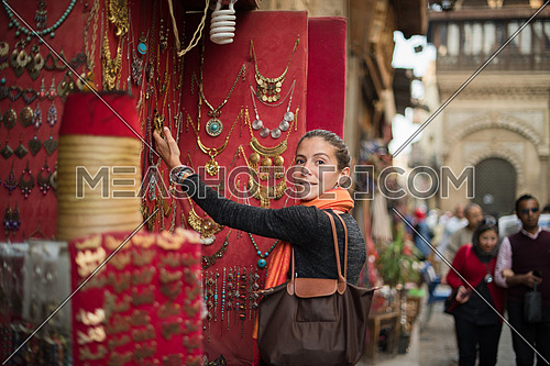 portrait of a young middle eastern woman to enjoy the Souvenir Market