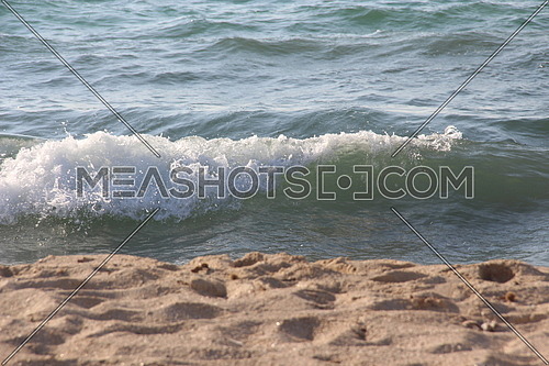 A photo of a wave in the mediterranean sea on the shore of Alexandria Egypt