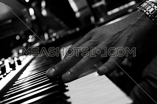 Piano Keyboards In Music Studio And A Hand Of A Musician