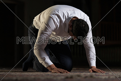 Young Muslim Man Is Praying In The Mosque