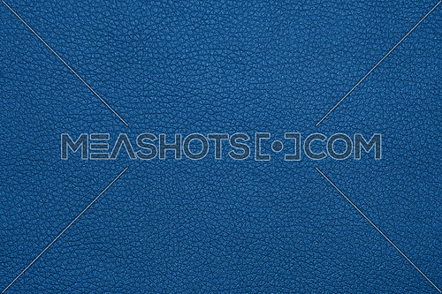 Close up background texture pattern of dark blue natural classic leather grain, directly above
