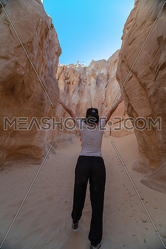 Female Tourist inside Makhroum Mountain in Sinai Trail at day