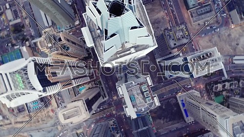 Top view of Dubai city. Aerial Drone fly over futuristic Dubai Marina district on beautiful day. Residential Modern skyscraper buildings