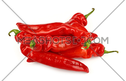 Group of several whole fresh red sweet paprika peppers isolated on white background, close up, high angle view