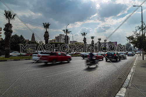 Long Shot for traffic at Salah Salim Street showing Le Baron Palace in background at Daytime