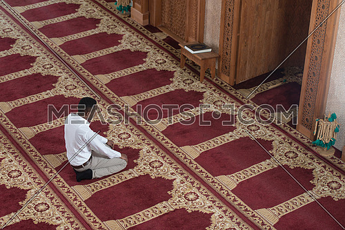 Black African Muslim Man Is Praying In The Mosque