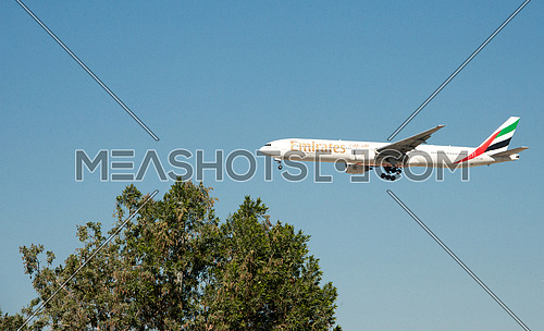 Emirates Airlines Boing 777-300 ER Airplane landing