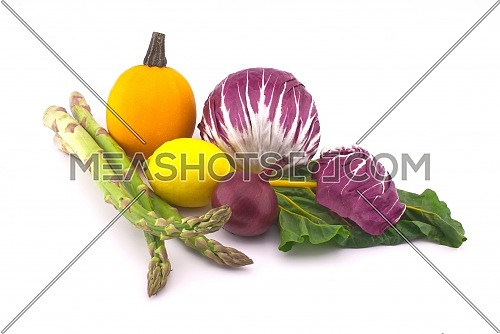 Assortment of fresh colorful including leaf beet, lemon, asparagus, radicchio salad, onion and garlic isolated on white background