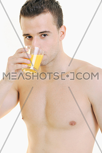 young fit man dringing orange juice isolated on white