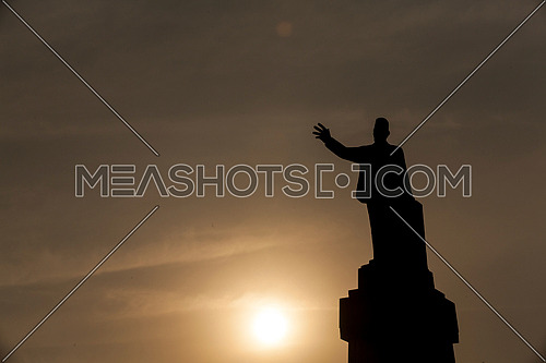 Long Sillhout Shot for Saad Zaghloul Statue at Cairo from Day to Sunset