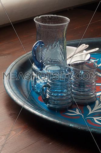 A set of Egyptian handmade glass ware on an oriental tray