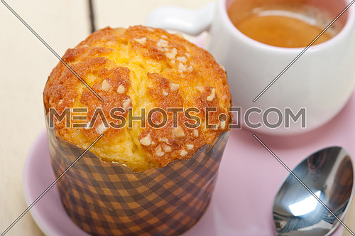 coffee and muffin served on a pink heart shaped dish